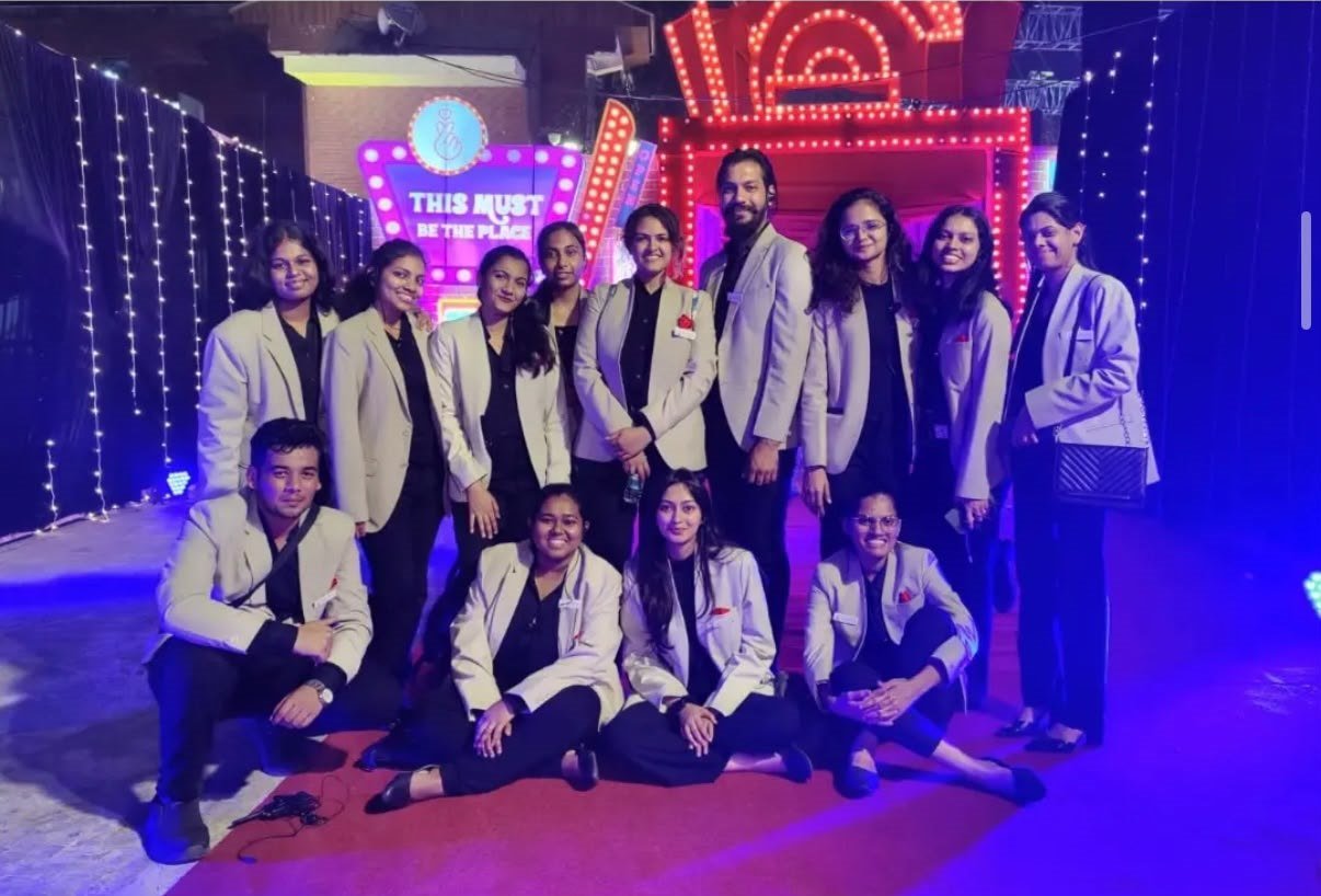 Uniformed guest reception team at a themed evening event